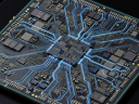 Detailed silicon die of high-end mobile graphics processing unit with illuminated circuit paths